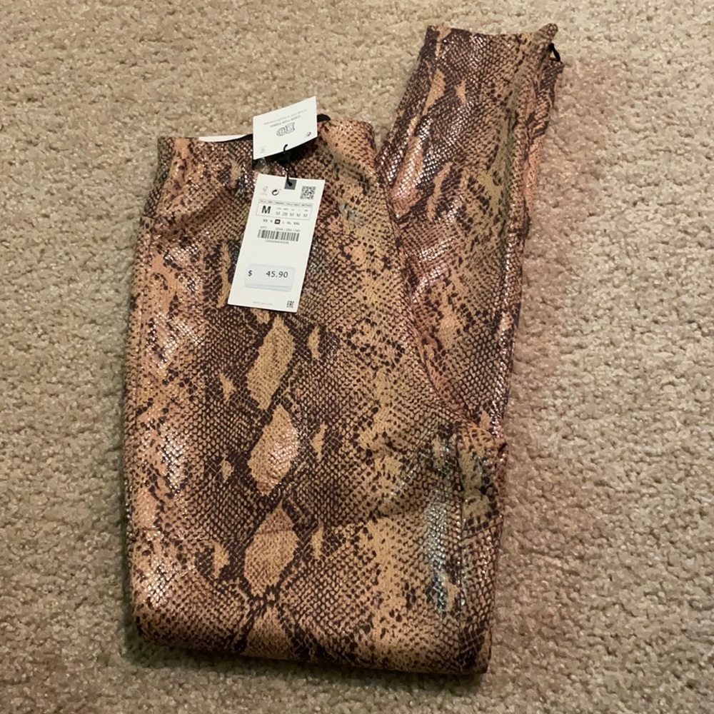 Women’s snakeskin leggings